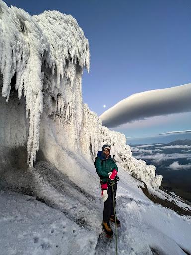 Woman standing on a snowy mountain